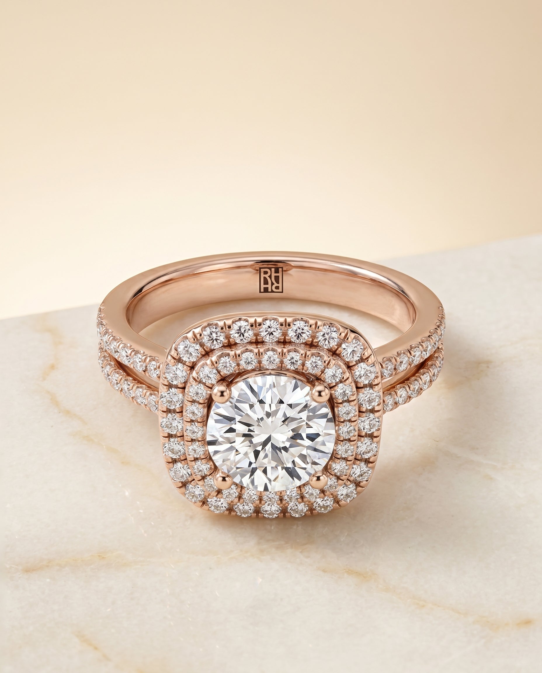 Round Brilliant, Linear Double Row Halo, in 14K Rose Gold, pave setting – angled view | RockHer