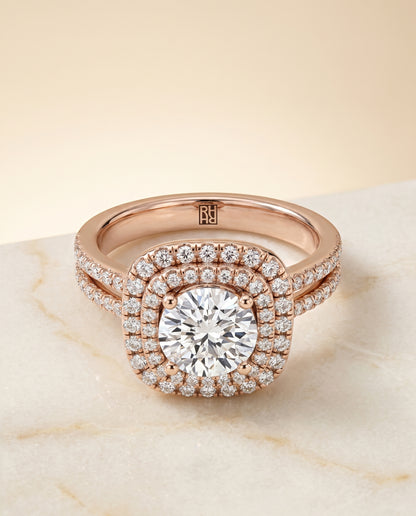 Round Brilliant, Linear Double Row Halo, in 14K Rose Gold, pave setting – angled view | RockHer