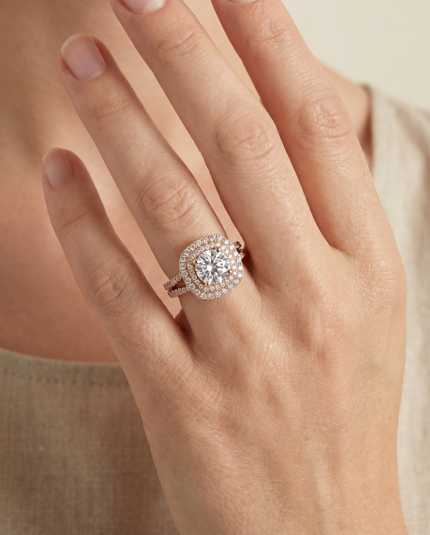 Round Brilliant, Linear Double Row Halo, in 14K Rose Gold, pave setting – lifestyle shot | RockHer