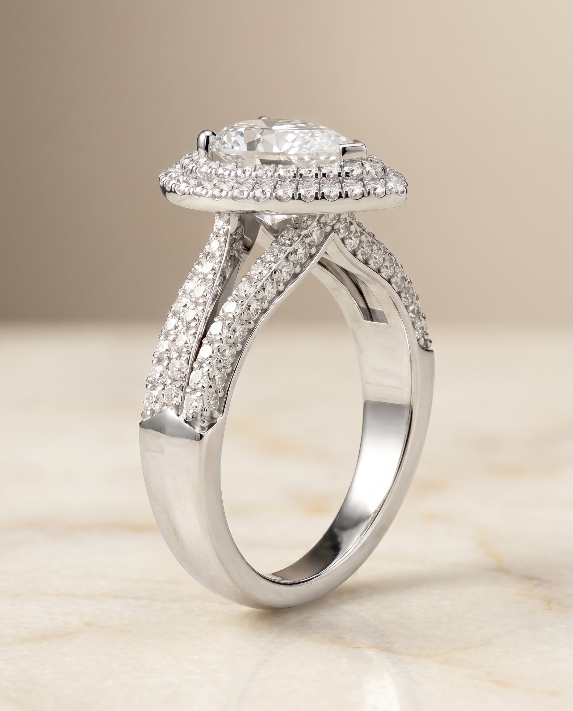 Three Tier Halo Crown styling on The Mariah pear engagement ring setting | RockHer