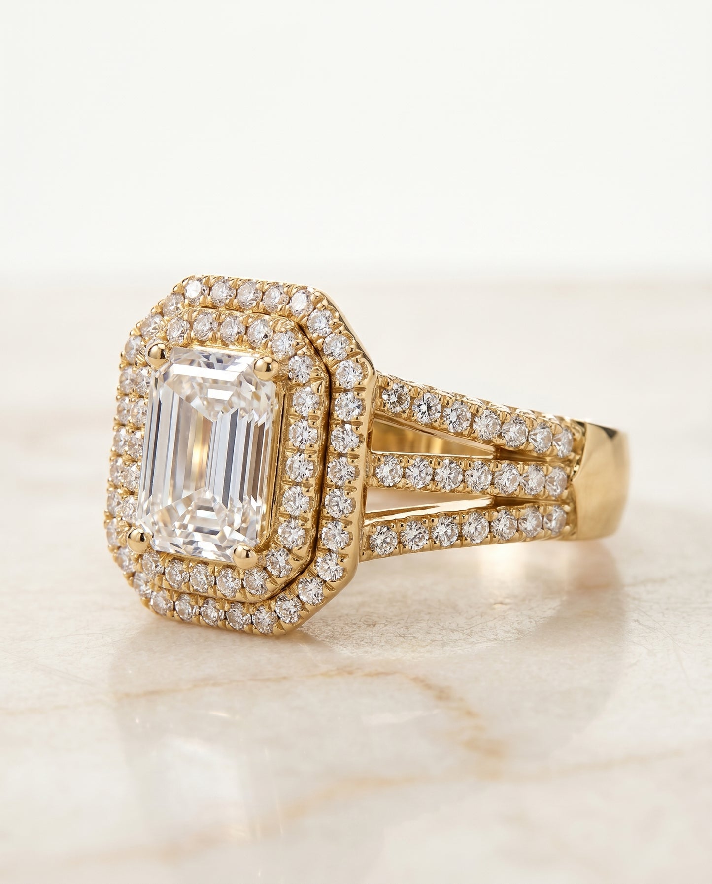 The Mariah Pavé Halo Engagement Ring Setting for Emerald Cut Diamonds in 18K Yellow Gold