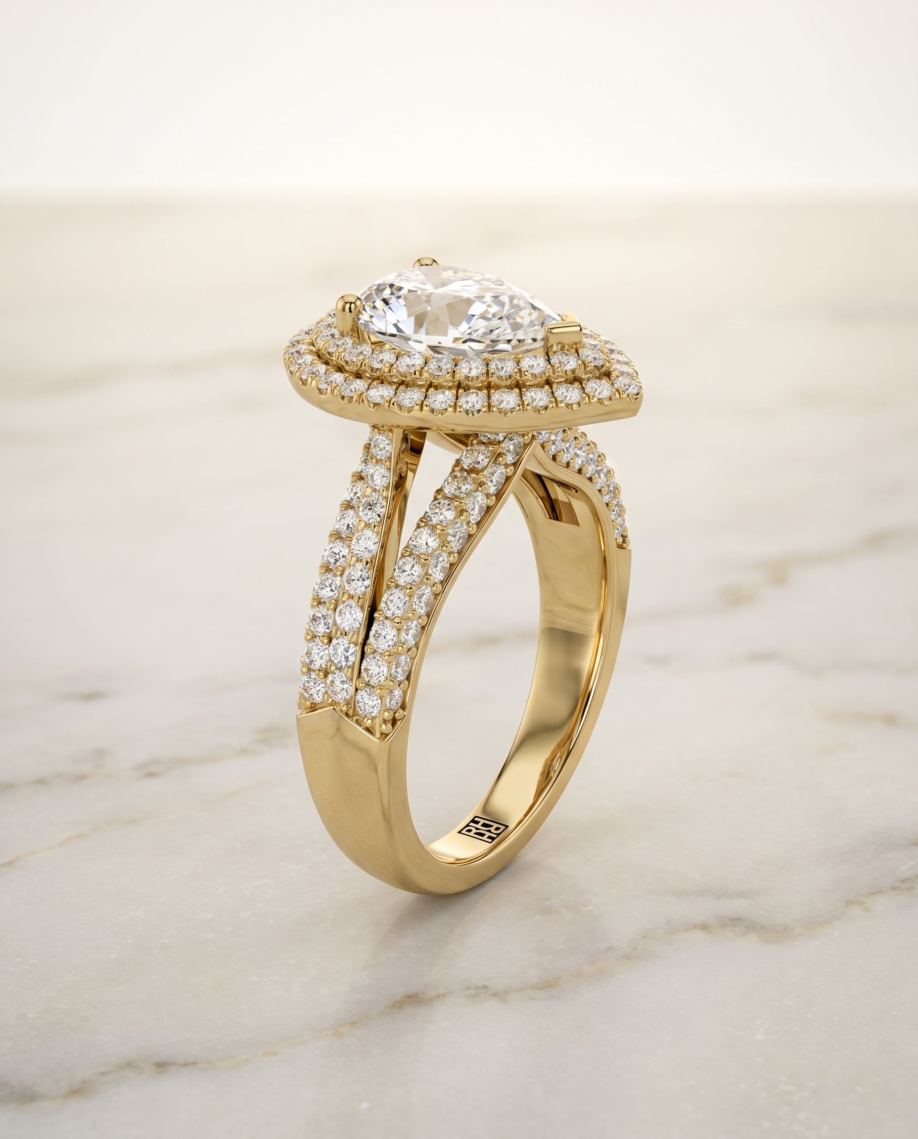 Three Tier Halo Crown styling on The Mariah pear engagement ring setting | RockHer