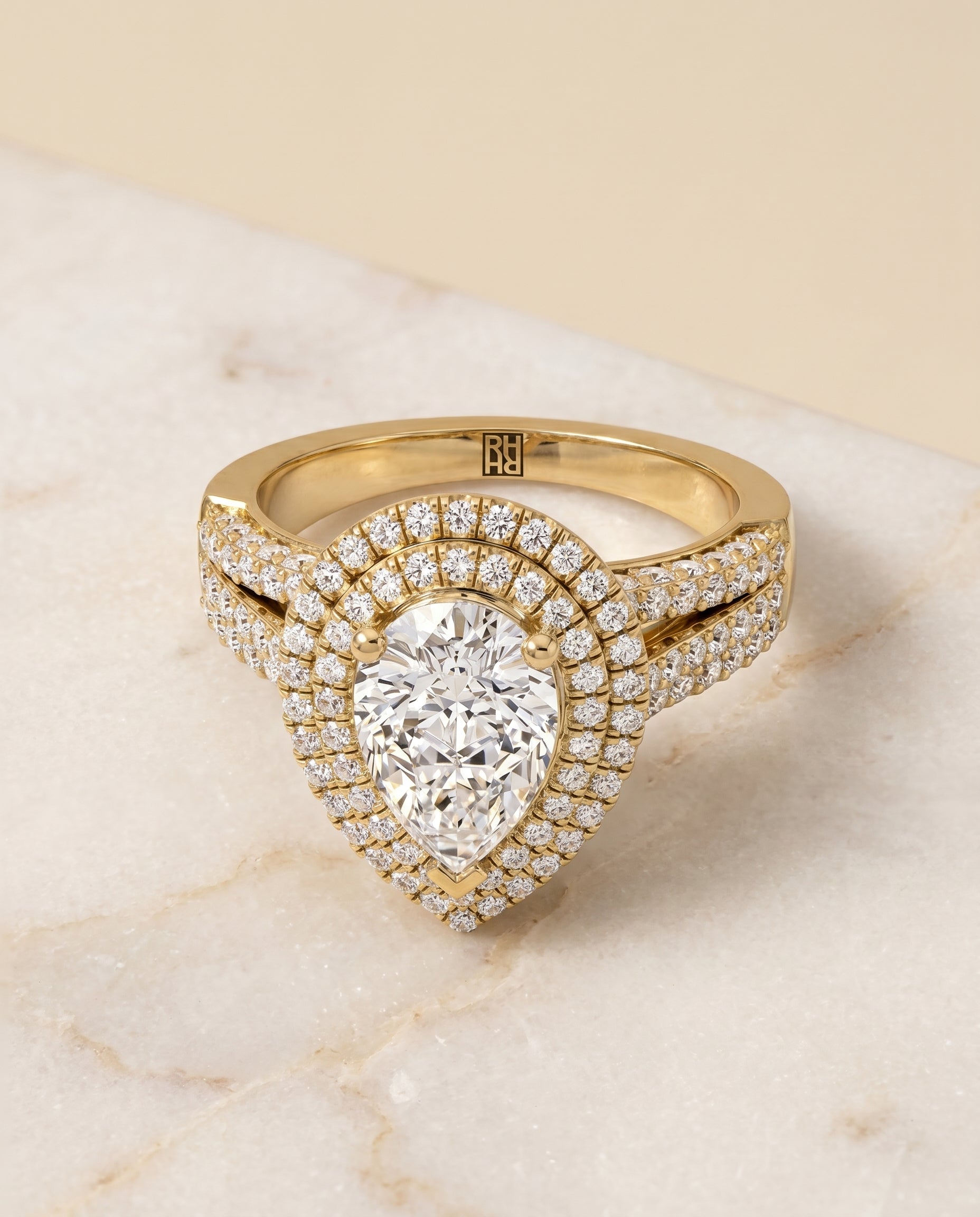 Mariah Select Halo Pear Lab Diamond Engagement Ring in 18K Yellow Gold, shown on hand, angled | RockHer