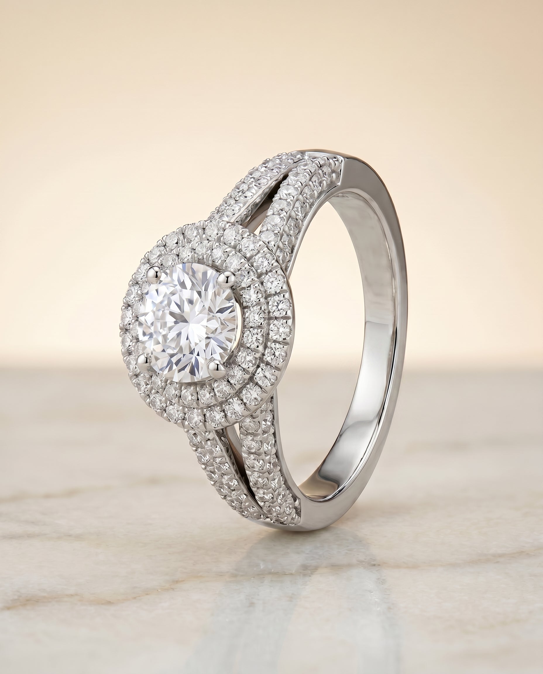 The Mariah setting for round diamonds, made to order in Platinum | RockHer