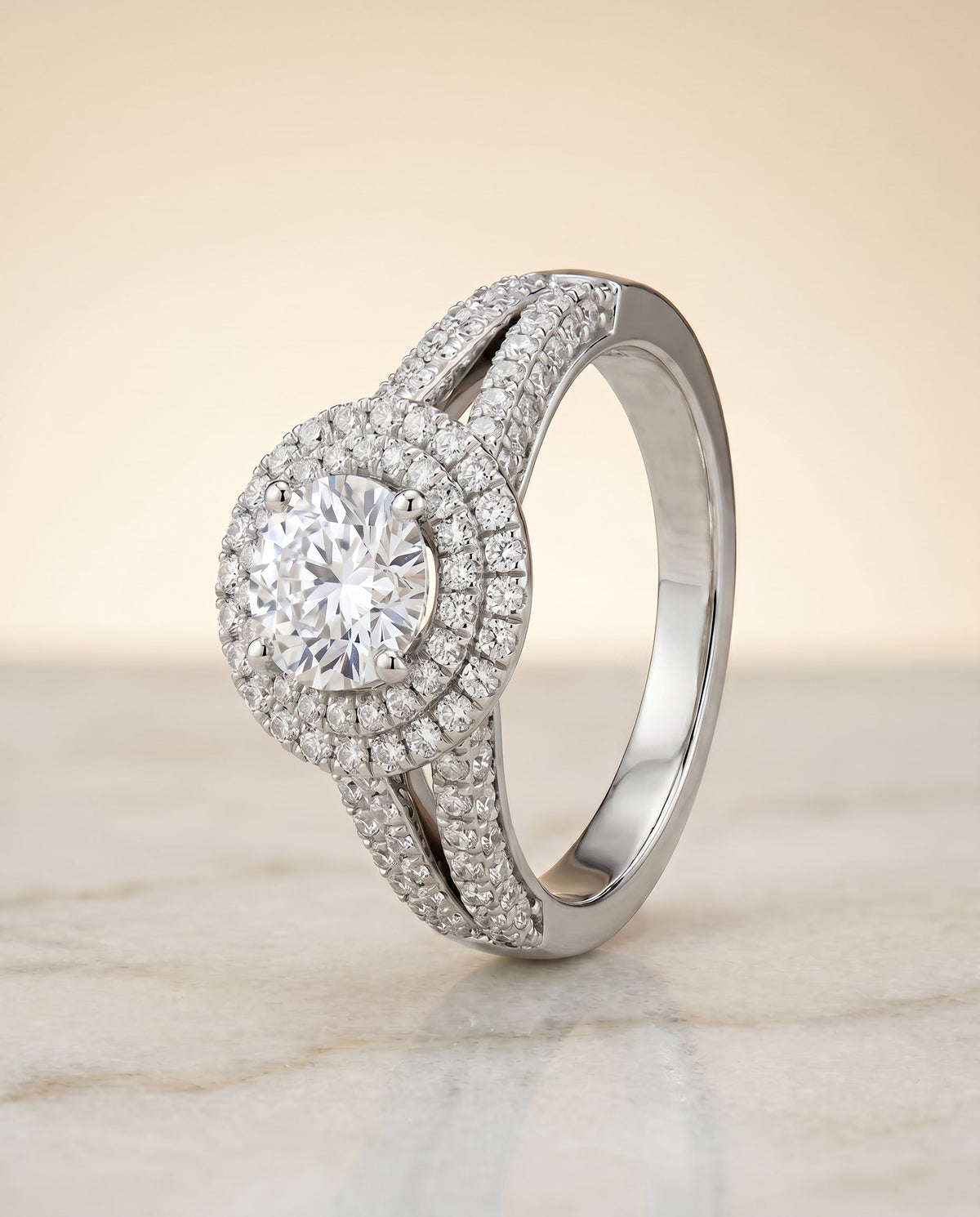 The Mariah setting for round diamonds, made to order in Platinum | RockHer