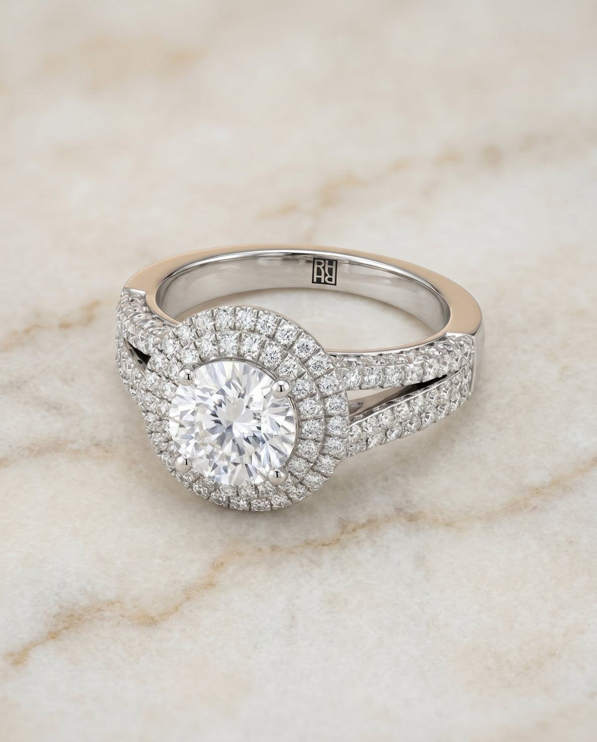 Mariah Select Halo Round Lab Diamond Engagement Ring in Platinum, shown on hand, angled | RockHer