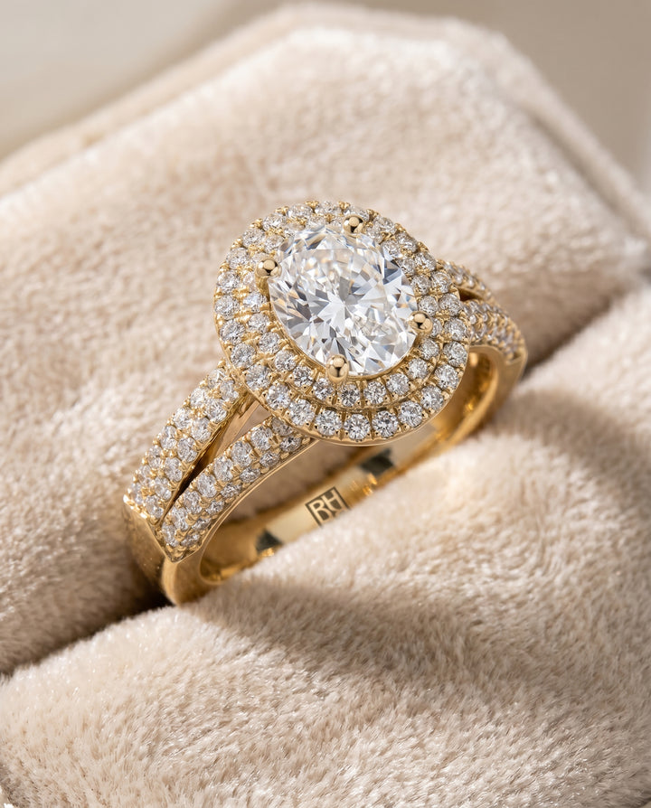 The Mariah Halo Engagement Ring Setting for Oval Diamonds in 18K Yellow Gold