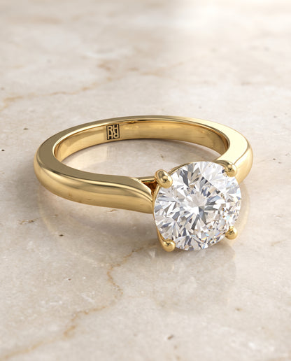 The Mary Comfort Fit Cathedral Solitaire Round Engagement Ring Setting in 18K Yellow Gold