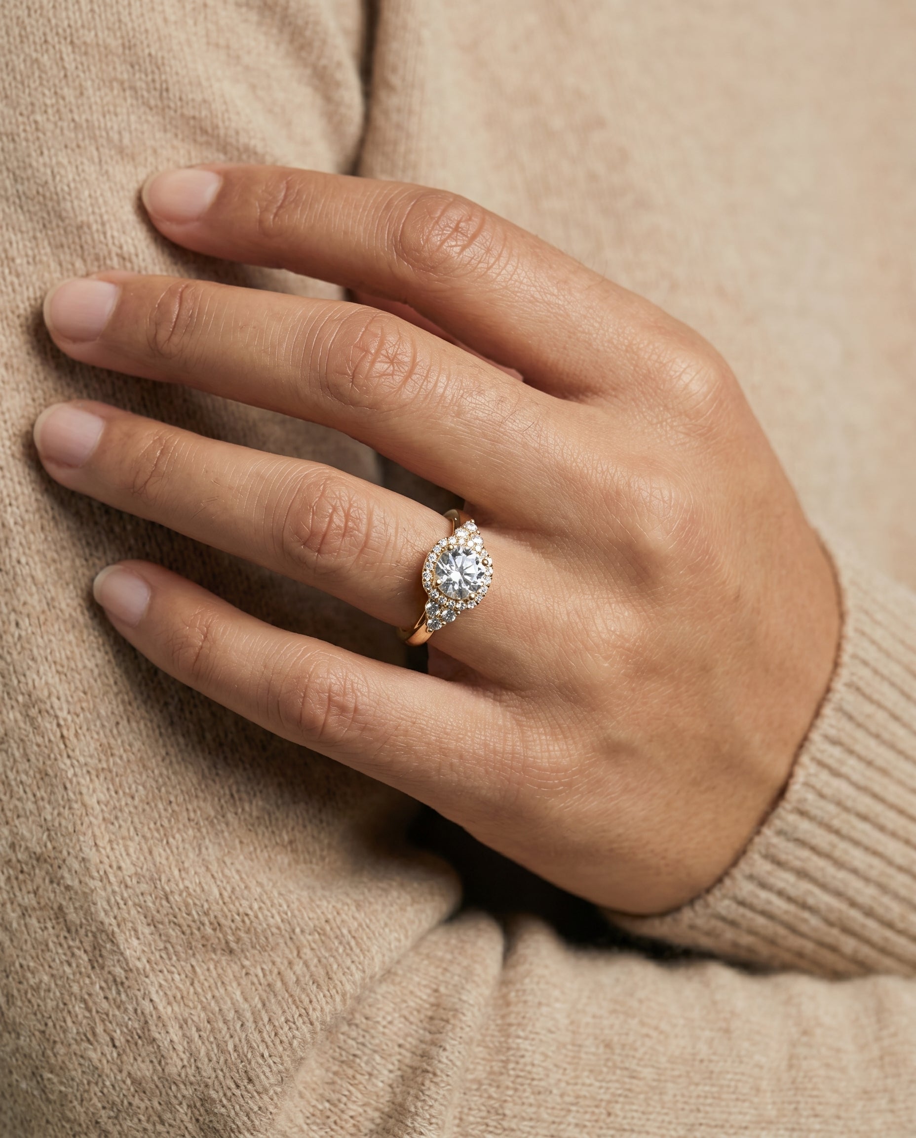 Melisma Select Open Twisted Triple Halo Round Lab Diamond Engagement Ring in 18K Yellow Gold, shown on hand, angled | RockHer
