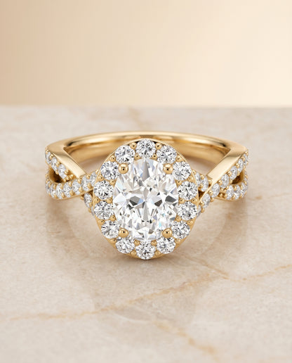 The Melody Twisted Pavé Halo Engagement Ring Setting for Oval Diamonds in 18K Yellow Gold | RockHer