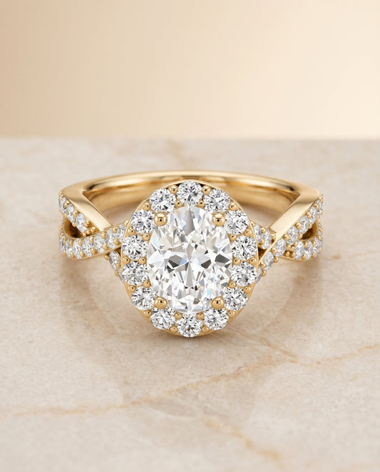 The Melody Twisted Pavé Halo Engagement Ring Setting for Oval Diamonds in 18K Yellow Gold | RockHer