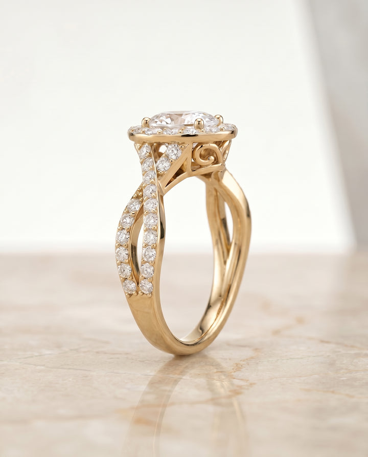 The Melody Twisted Pavé Halo Engagement Ring Setting for Oval Diamonds in 18K Yellow Gold