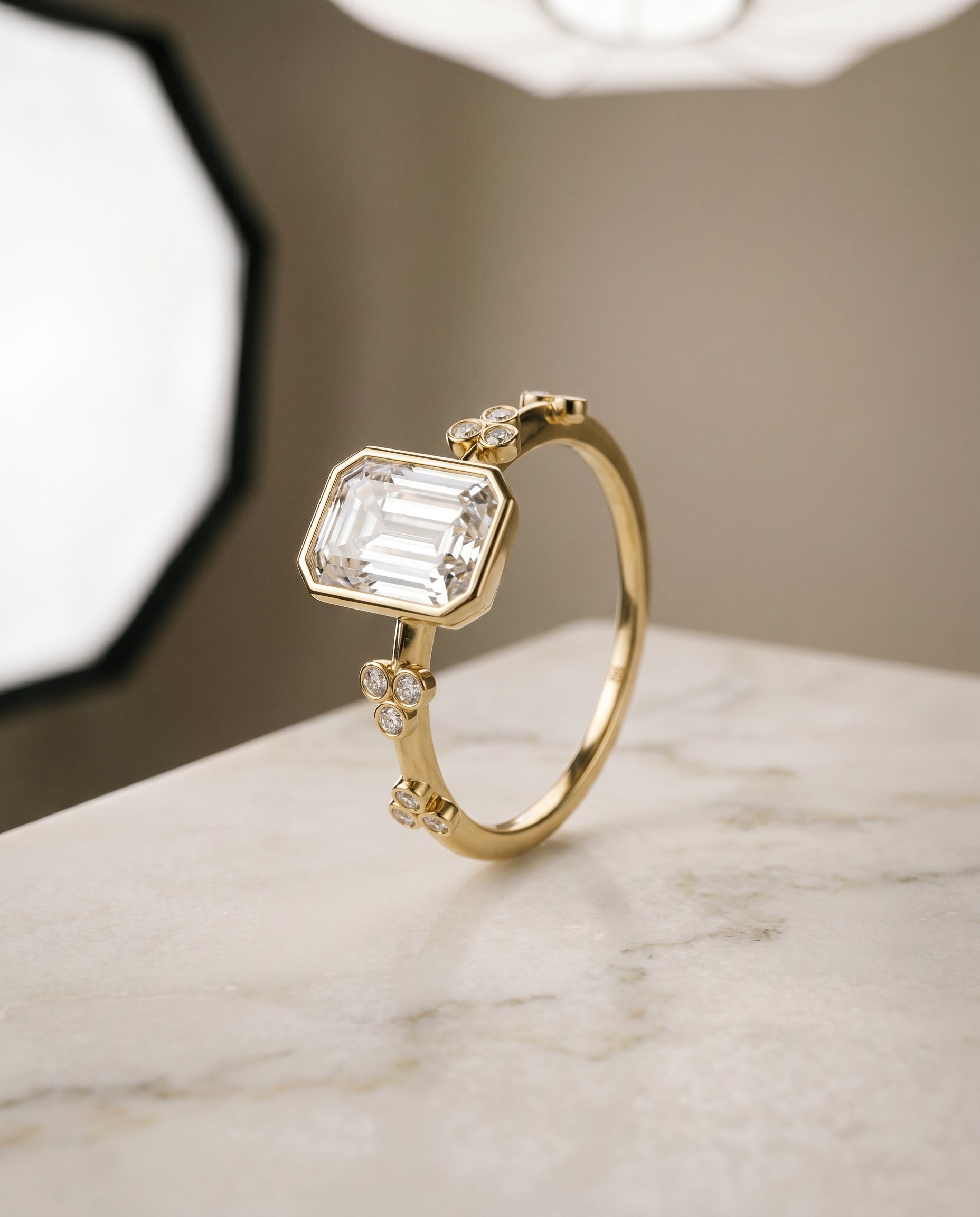 Clover Bezel Accent Solitaire Cut styling on The Miley emerald engagement ring setting | RockHer