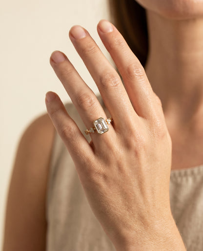 The Miley Clover Bezel Accent Solitaire Emerald Cut Engagement Ring Setting in 18K Yellow Gold