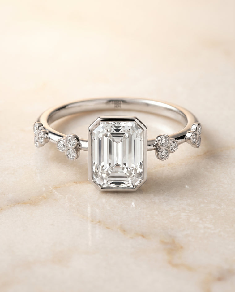 The Miley Clover Bezel Accent Solitaire Emerald Cut Engagement Ring Setting in Platinum