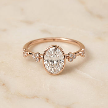The Miley Clover Bezel Accent Solitaire Oval Engagement Ring Setting in 14K Rose Gold