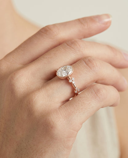The Miley Clover Bezel Accent Solitaire Oval Engagement Ring Setting in 14K Rose Gold