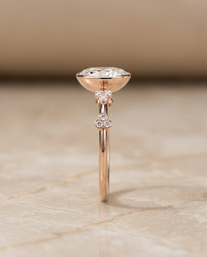 The Miley Clover Bezel Accent Solitaire Oval Engagement Ring Setting in 14K Rose Gold