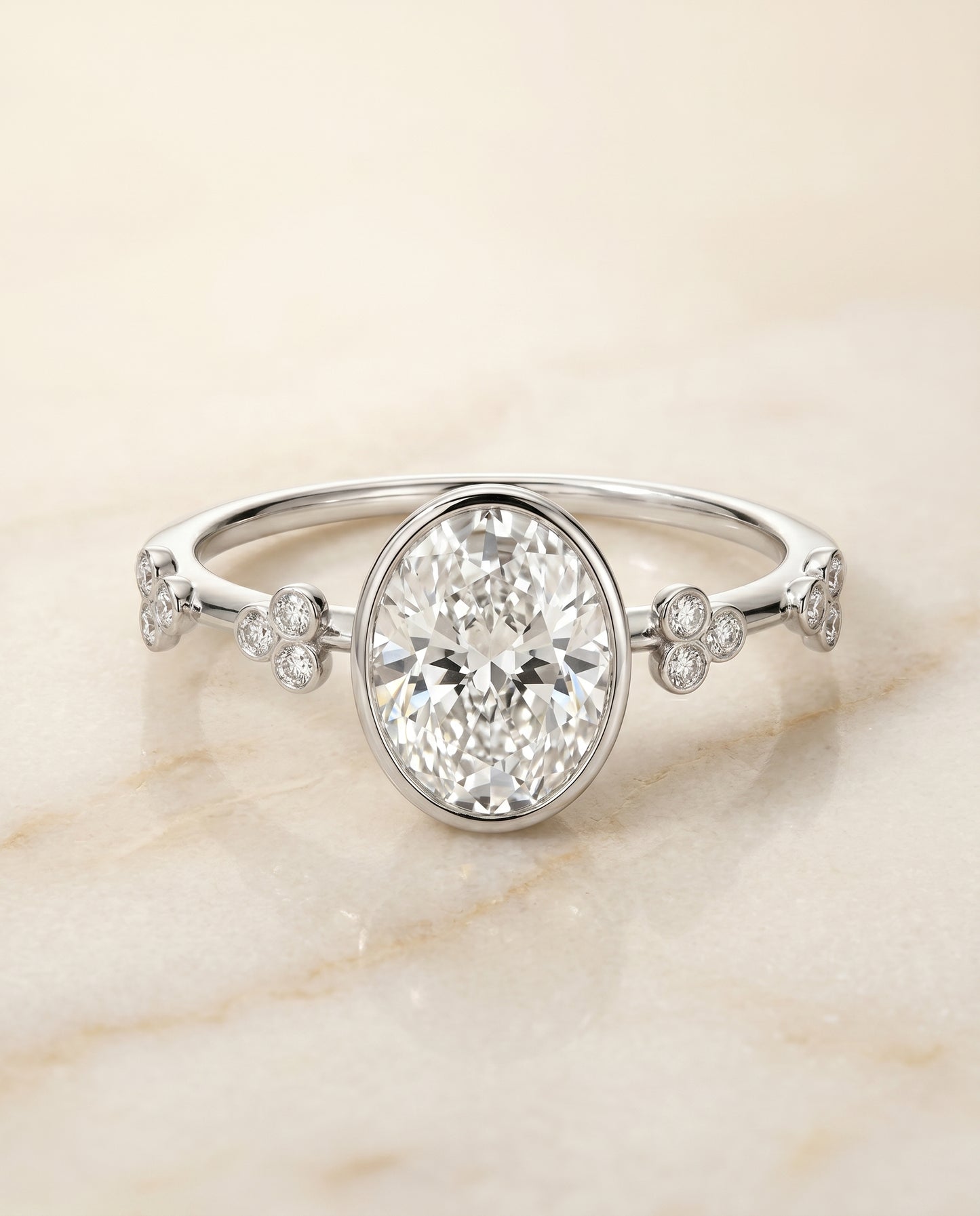 The Miley Bezel Solitaire Engagement Ring Setting for Oval Diamonds in 18K White Gold