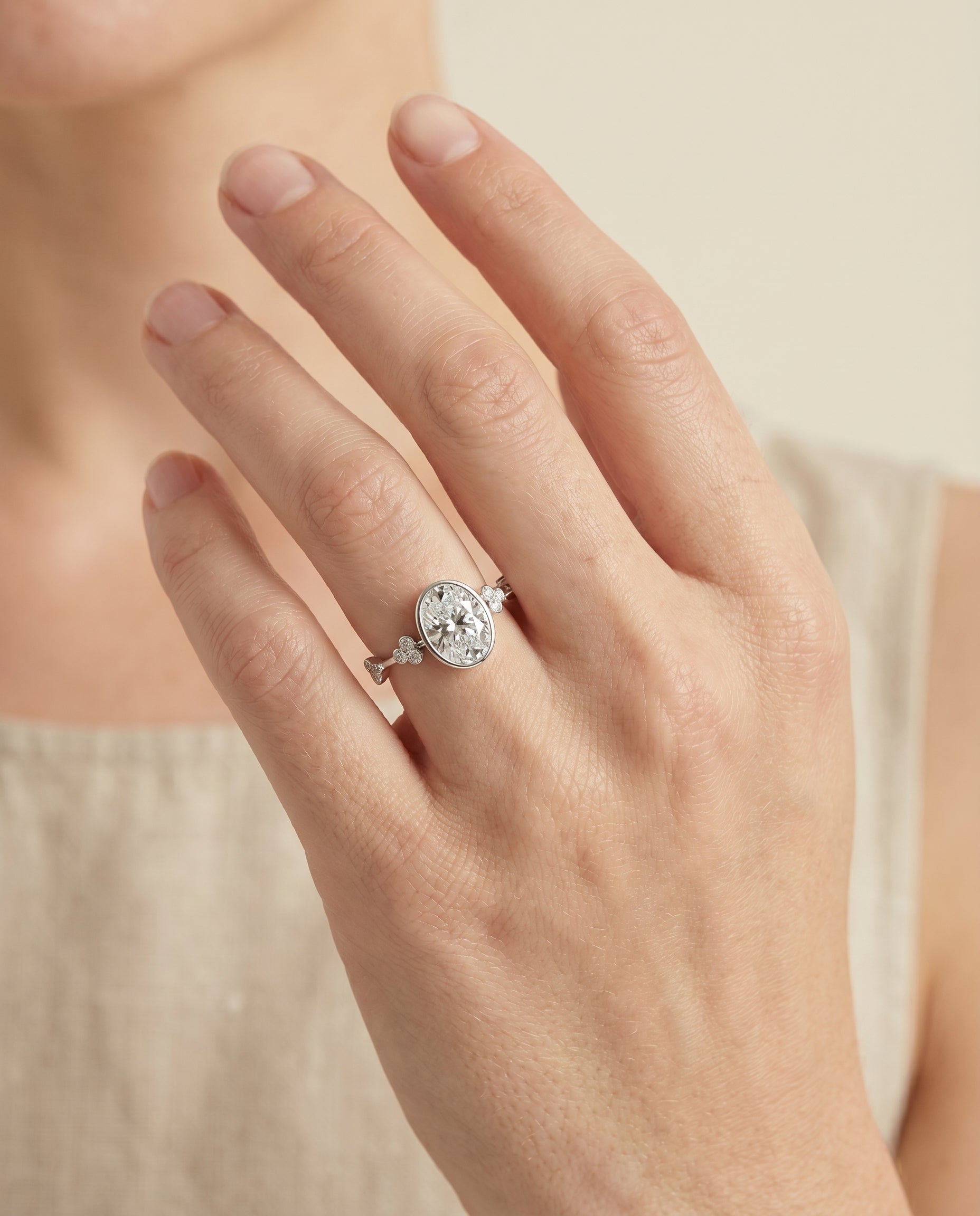 The Miley engagement ring setting in Platinum, clover bezel accent solitaire design | RockHer