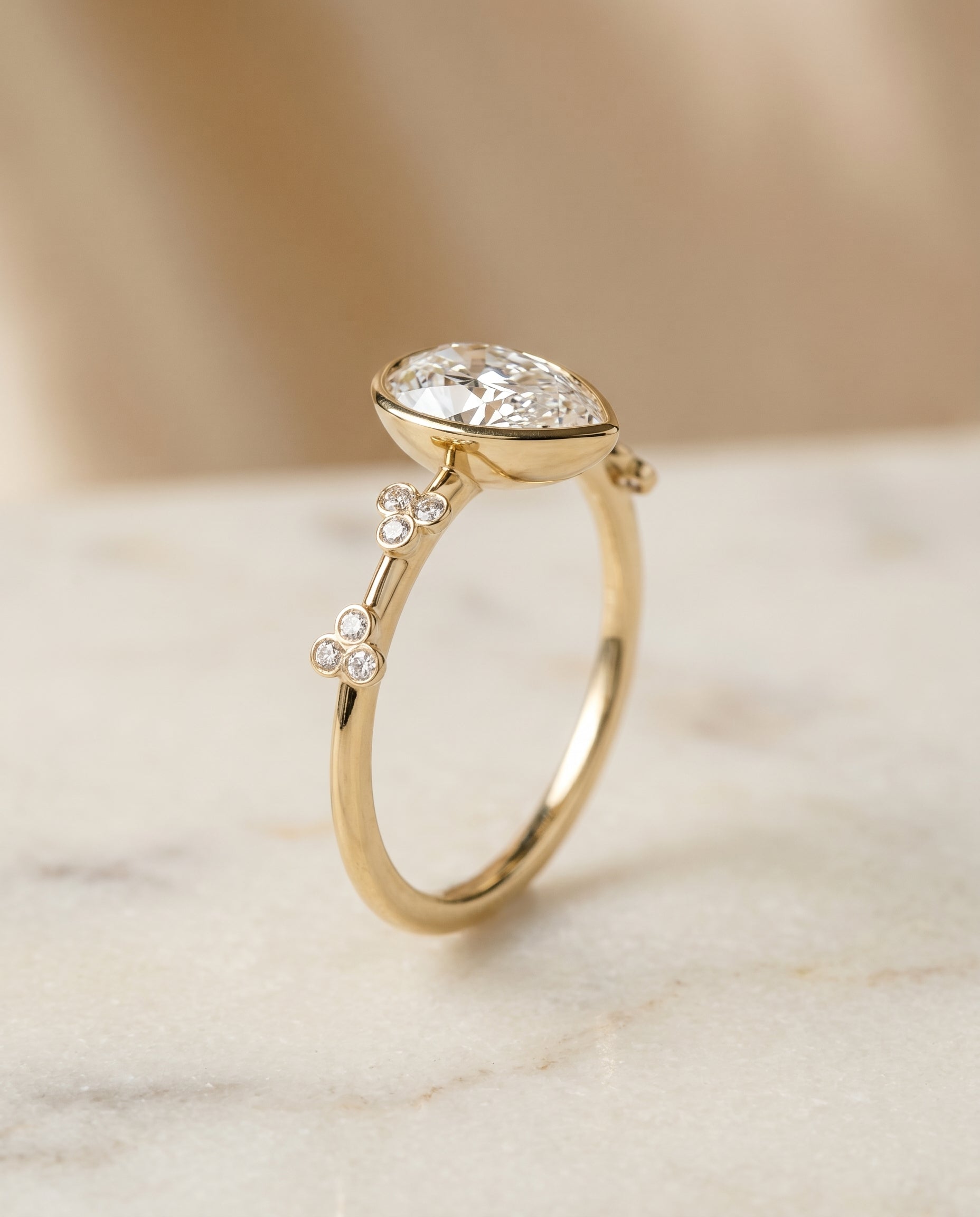 Clover Bezel Accent Solitaire styling on The Miley princess engagement ring setting | RockHer
