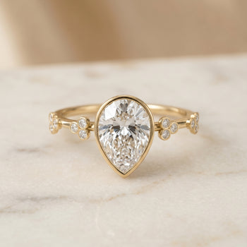 The Miley Clover Bezel Accent Solitaire Princess Cut Engagement Ring Setting in 18K Yellow Gold