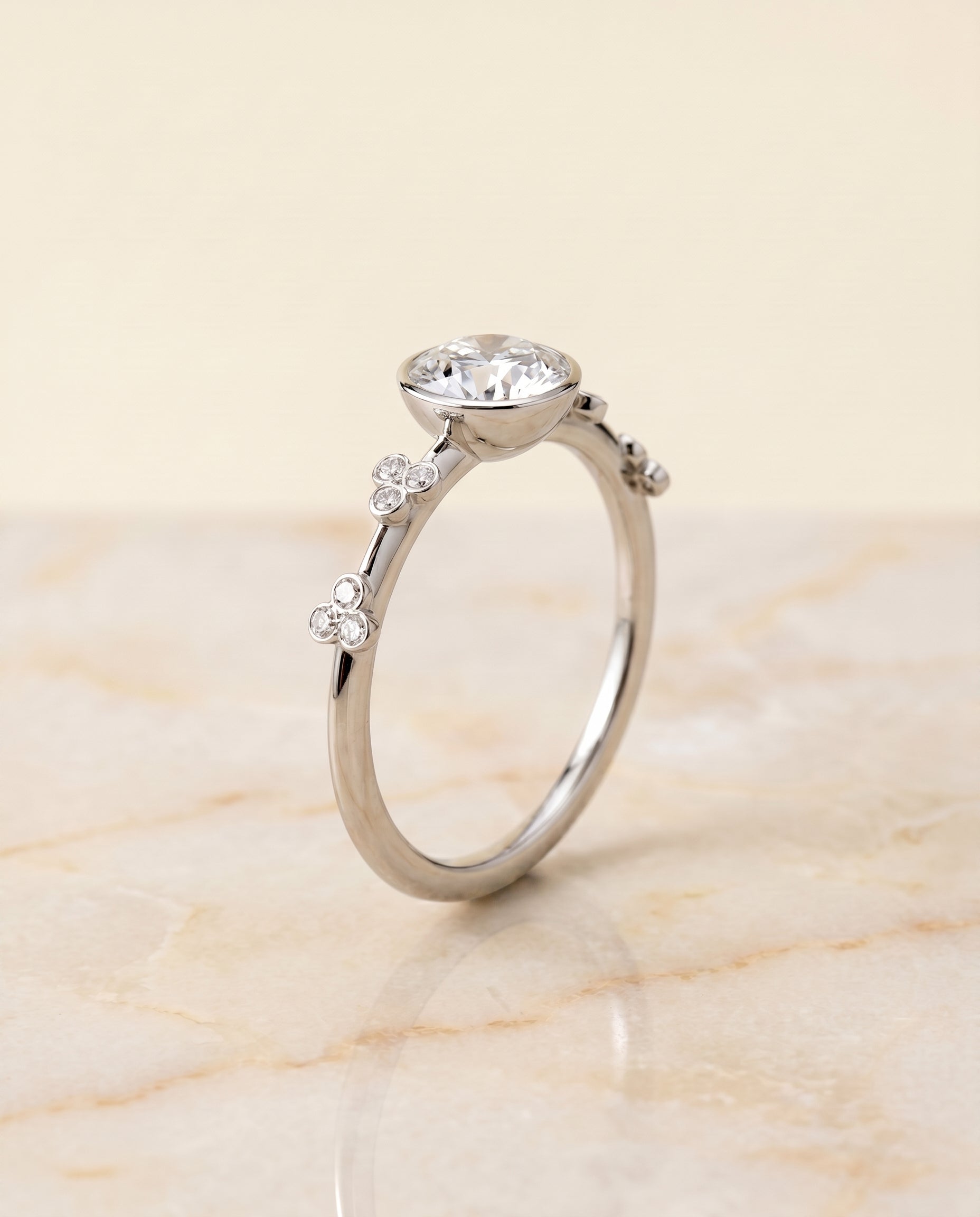 Miley Select Clover Bezel Accent Solitaire Round Lab Diamond Engagement Ring in Platinum, front view | RockHer