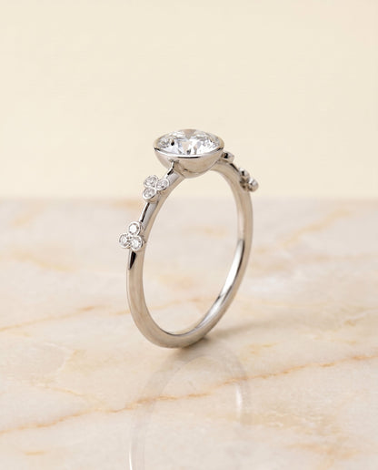 Select Clover Bezel Accent Solitaire Cut styling on The Miley emerald engagement ring setting | RockHer