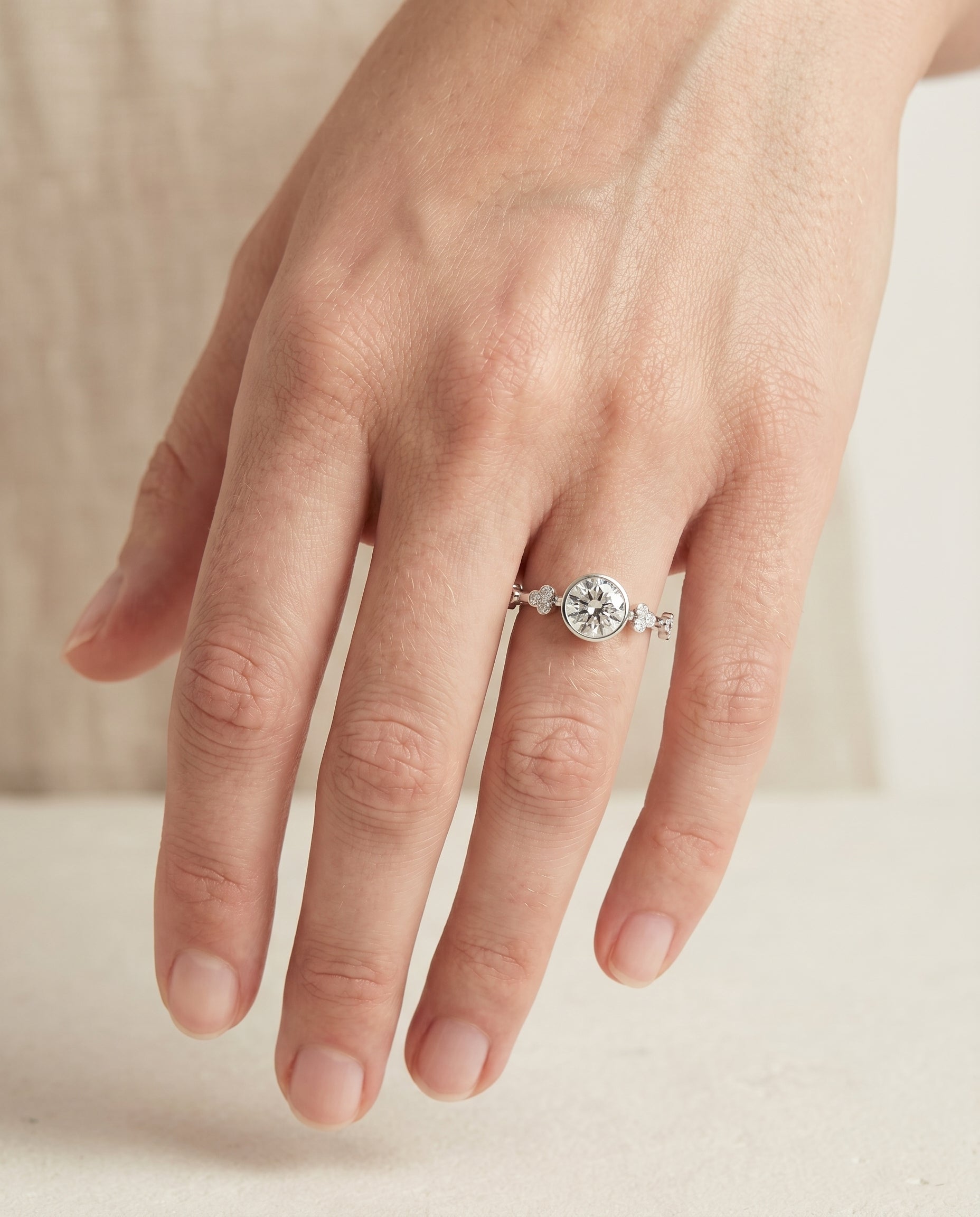 The Miley engagement ring setting in 18K White Gold, clover bezel accent solitaire design | RockHer