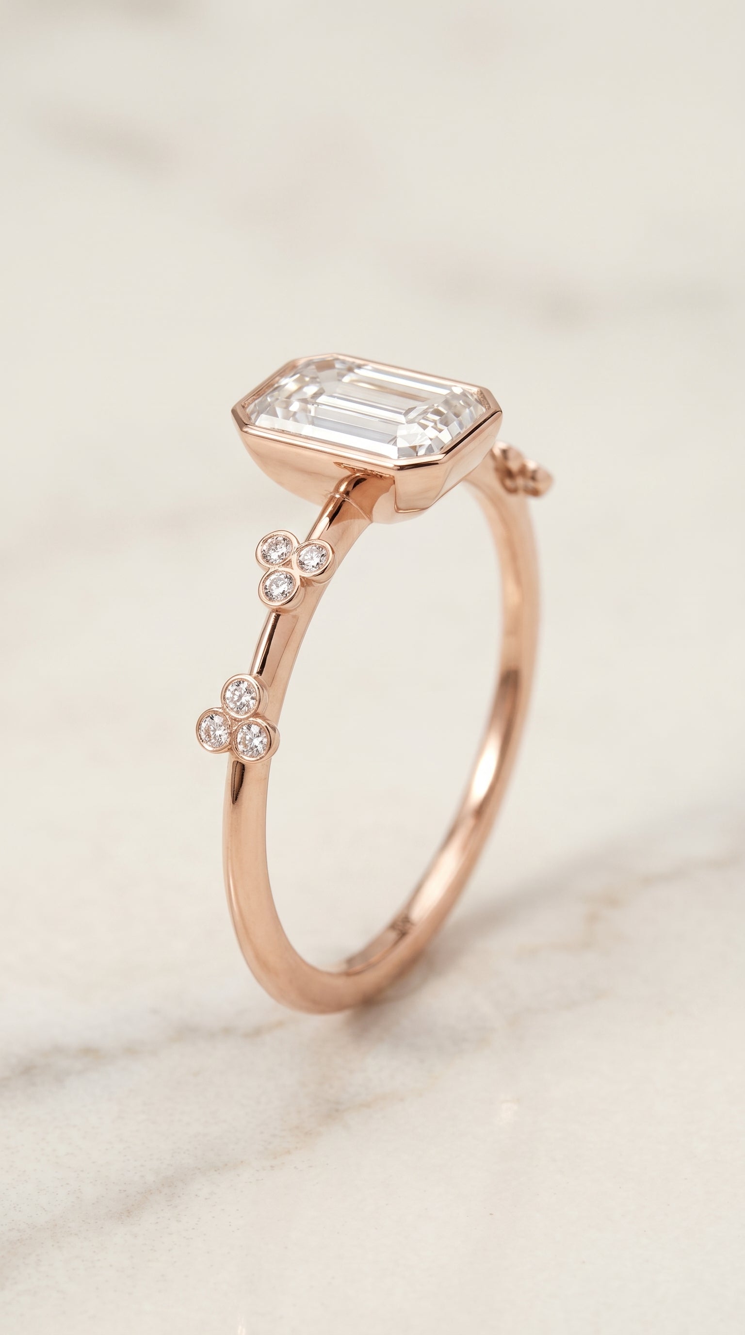 Clover Bezel Accent Solitaire Cut styling on The Miley emerald engagement ring setting | RockHer