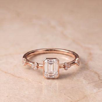 The Miley Clover Bezel Accent Solitaire Emerald Cut Engagement Ring Setting in 14K Rose Gold