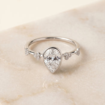 The Miley Clover Bezel Accent Solitaire Princess Cut Engagement Ring Setting in Platinum