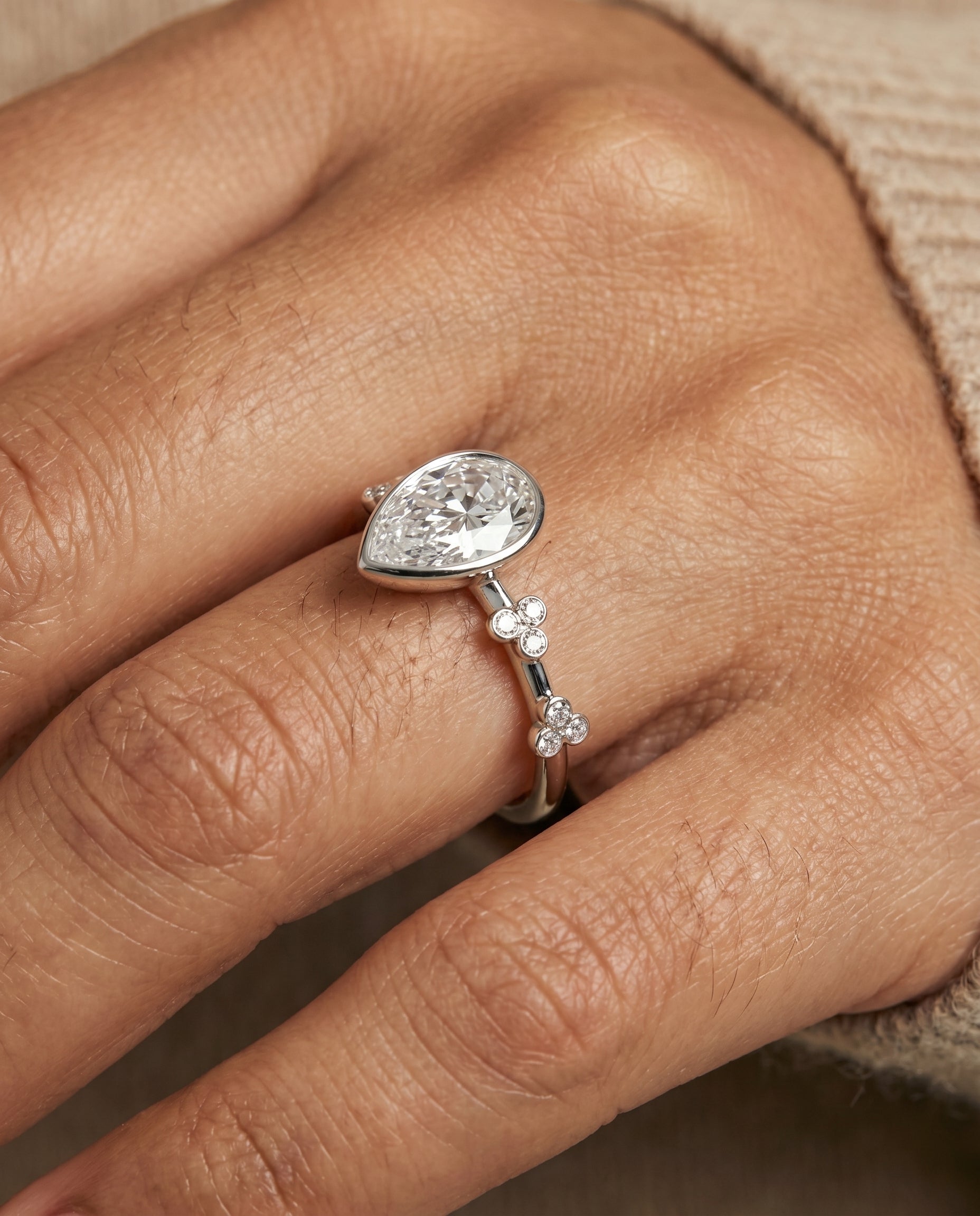 The Miley engagement ring setting in Platinum, clover bezel accent solitaire design | RockHer