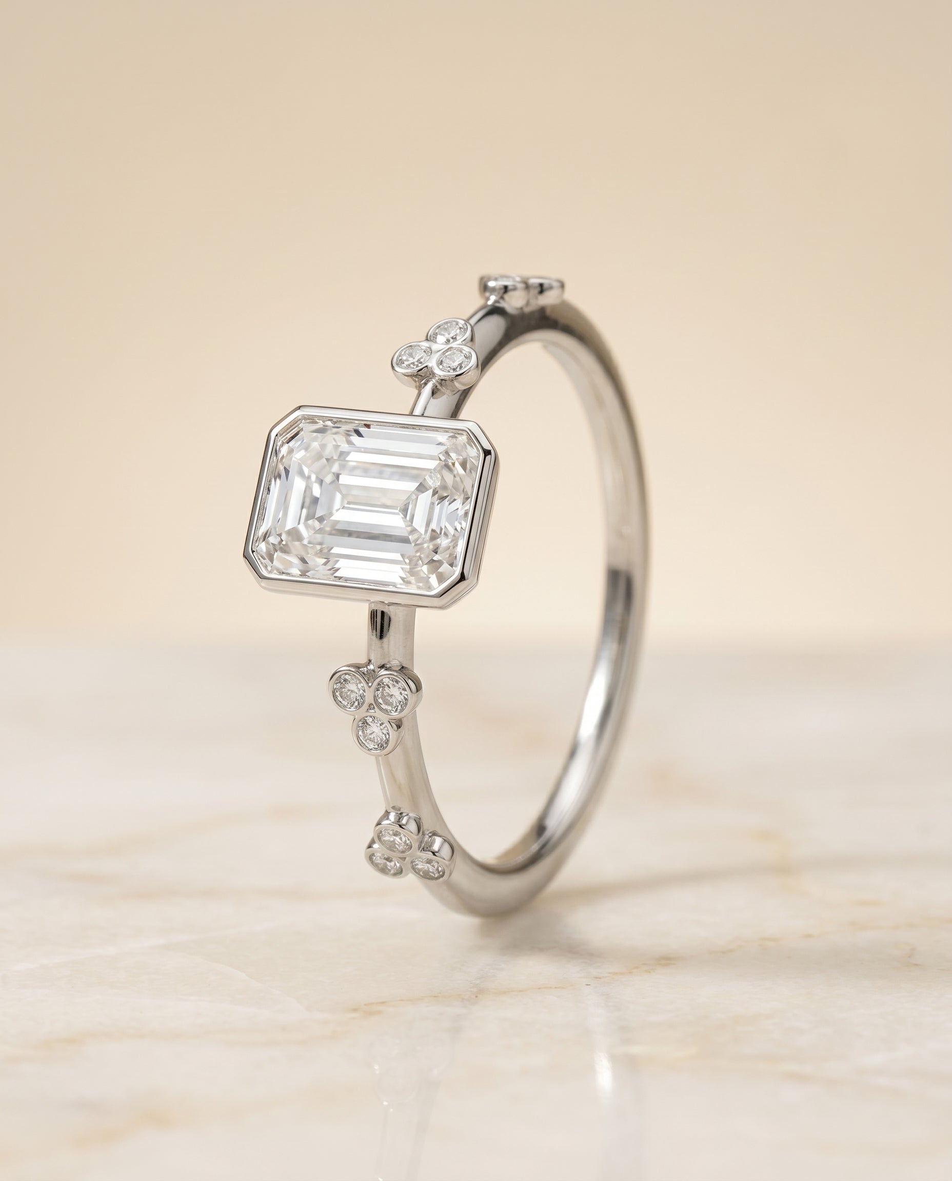 Clover Bezel Accent Solitaire Cut styling on The Miley radiant engagement ring setting | RockHer