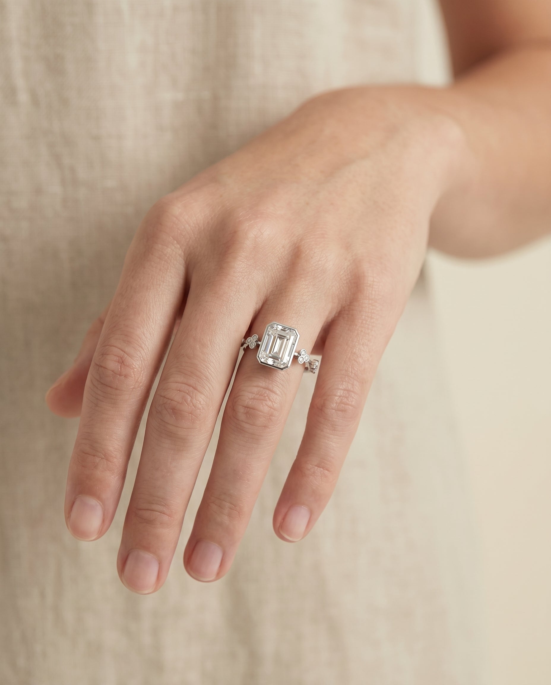 The Miley engagement ring setting in Platinum, clover bezel accent solitaire cut design | RockHer