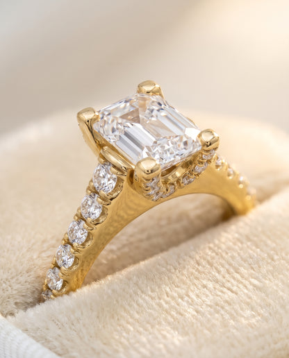 The Mimi Graduated Linear Pavé Emerald Cut Engagement Ring Setting in 18K Yellow Gold