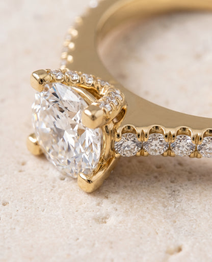 The Mimi Graduated Linear Pavé Round Engagement Ring Setting in 18K Yellow Gold