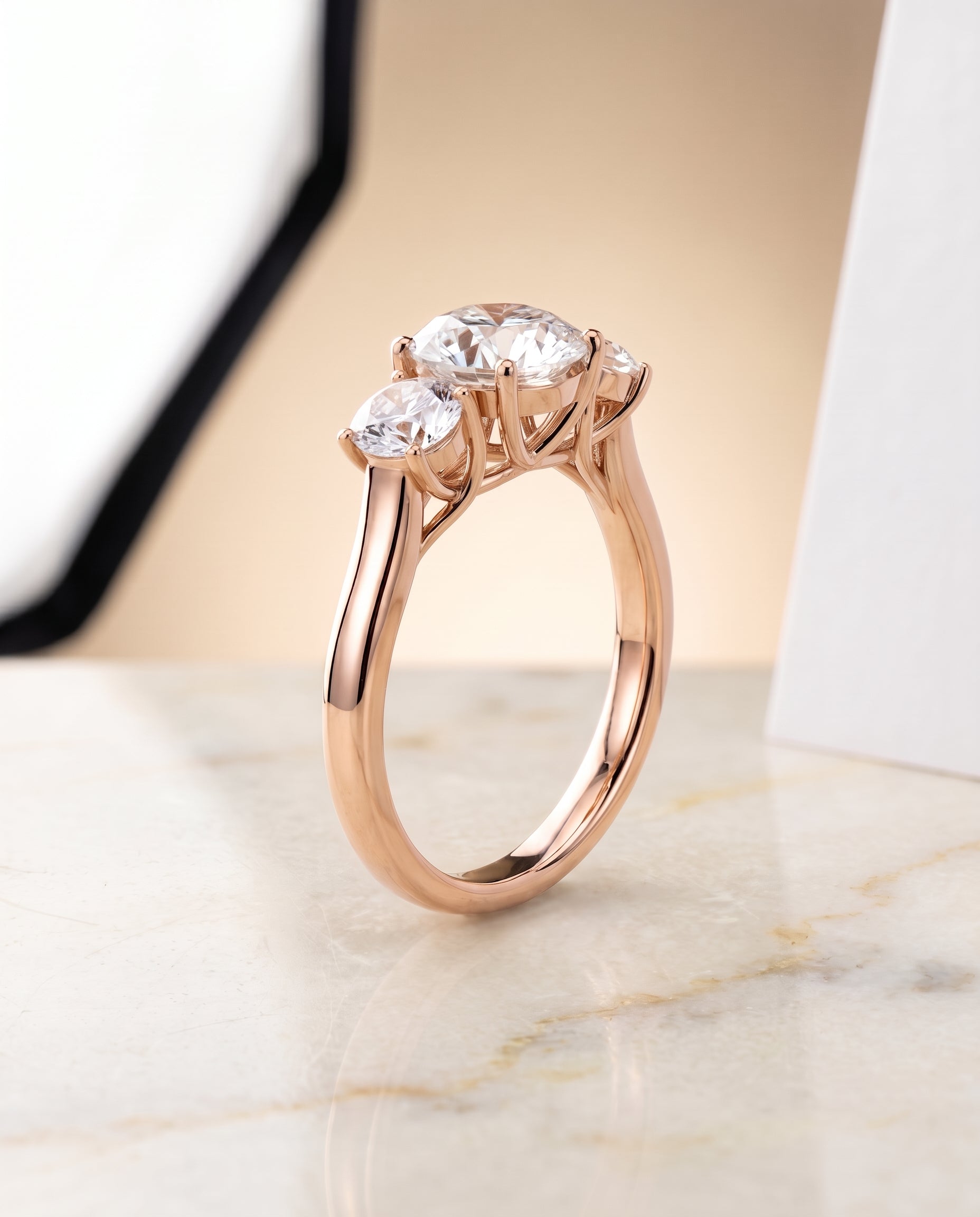 Classic Three Stone styling on The Natalie round engagement ring setting | RockHer
