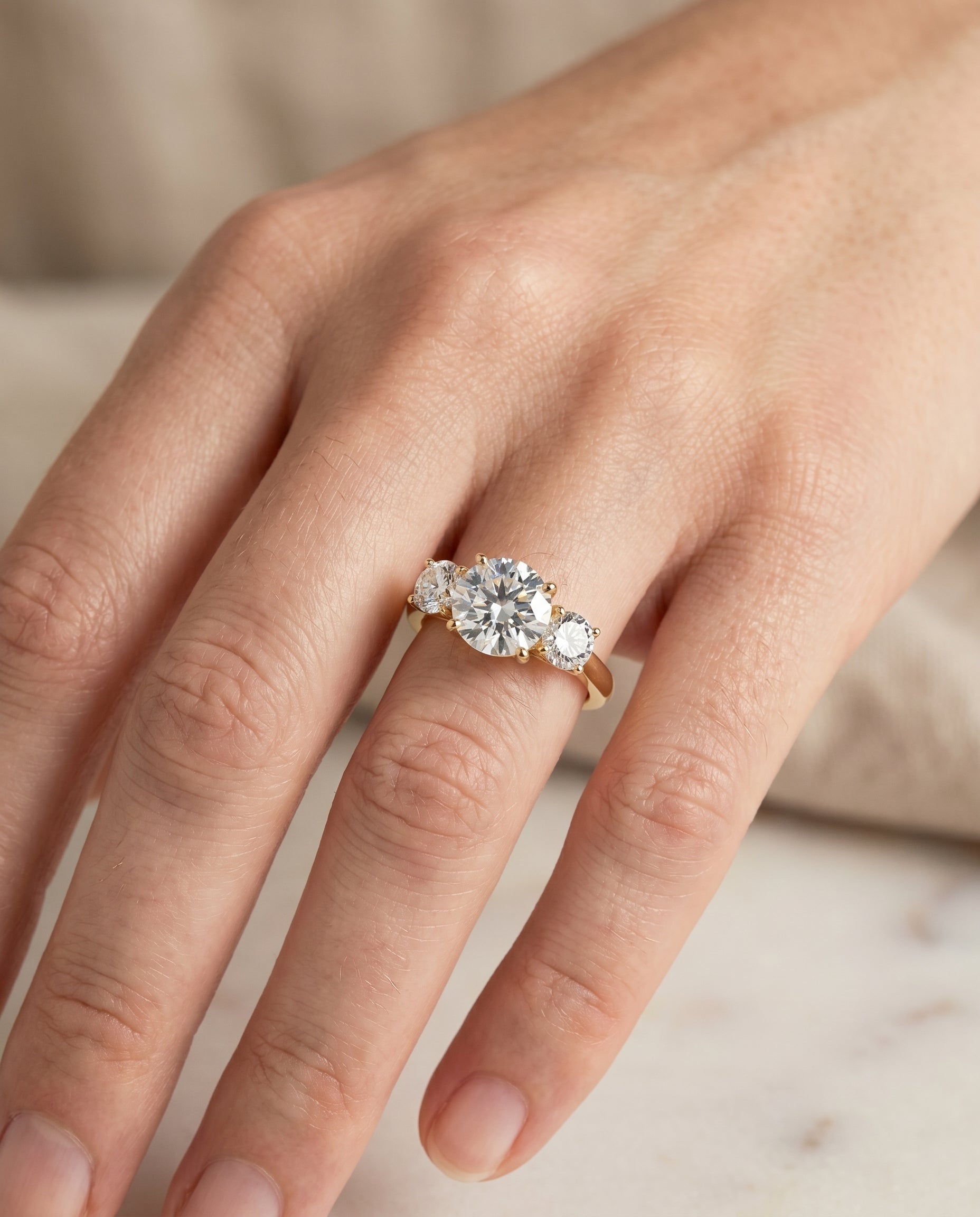 The Natalie engagement ring setting in 18K Yellow Gold, classic three stone design | RockHer