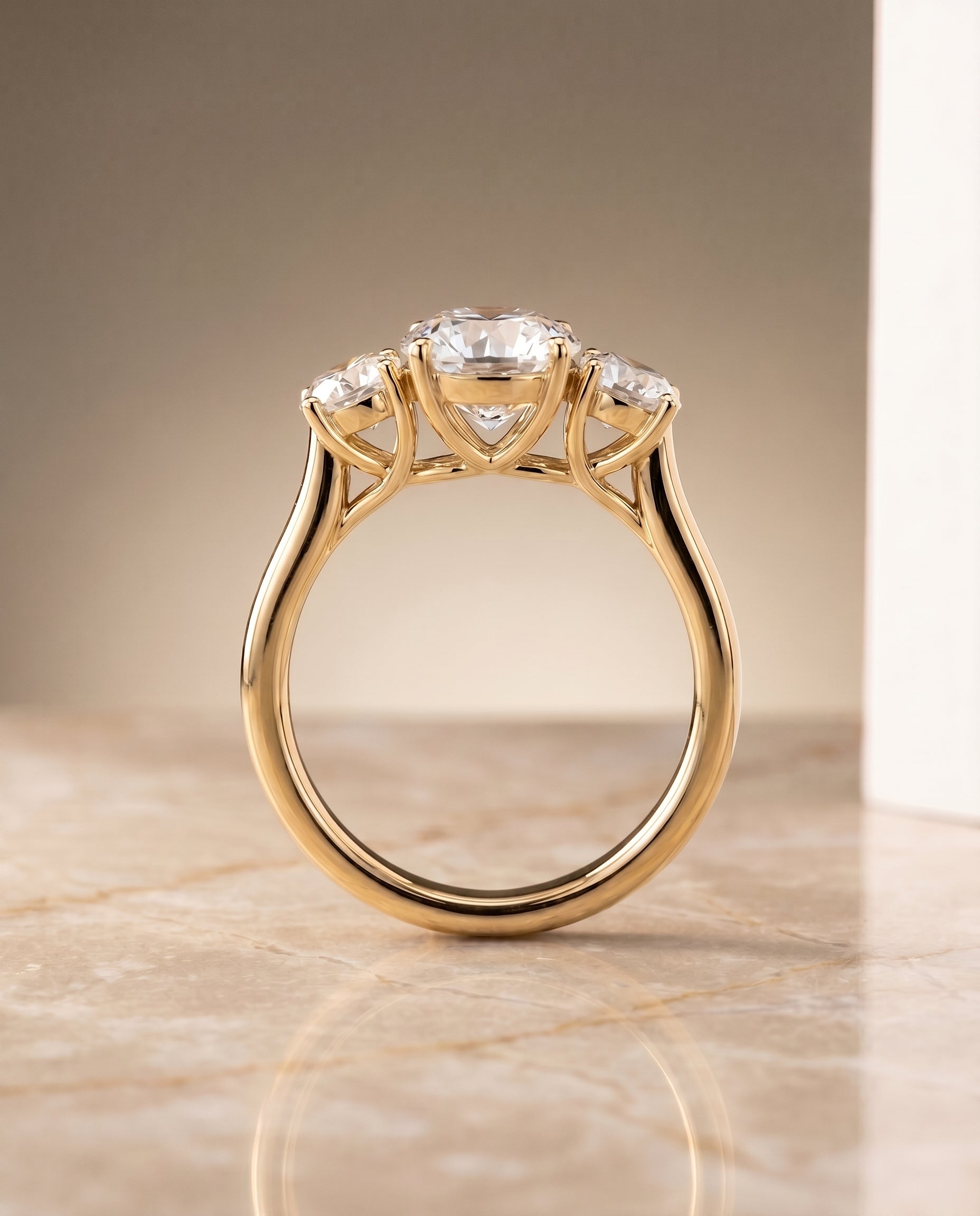 The Natalie setting for round diamonds, made to order in 18K Yellow Gold | RockHer