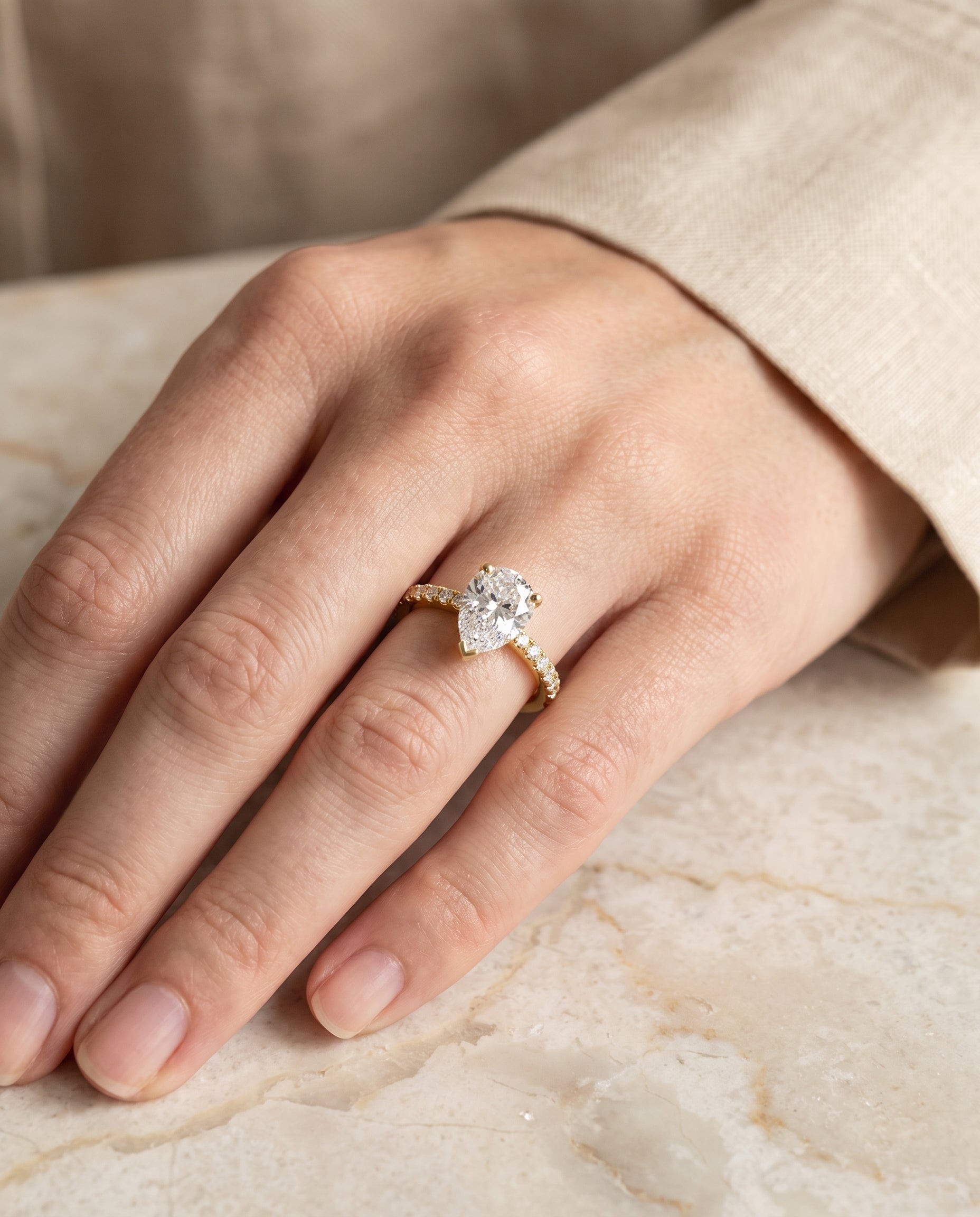 The Norah Classic Linear French Pavé Pear Engagement Ring Setting in 18K Yellow Gold