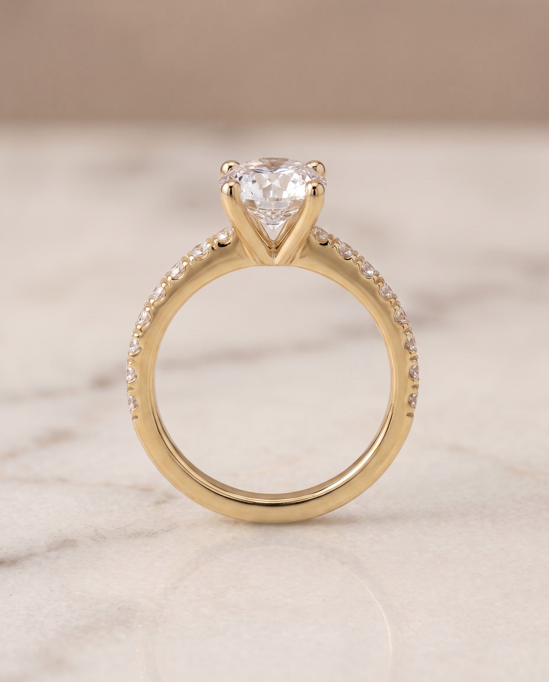 The Norah setting for round diamonds, made to order in 18K Yellow Gold | RockHer