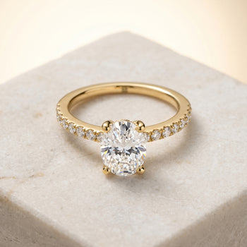 The Norah Classic Linear French Pavé Oval Engagement Ring Setting in 18K Yellow Gold