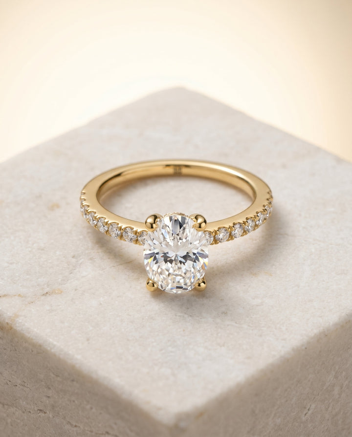 Norah Select Pavé Oval Lab Diamond Engagement Ring in 18K Yellow Gold, shown on hand, angled | RockHer