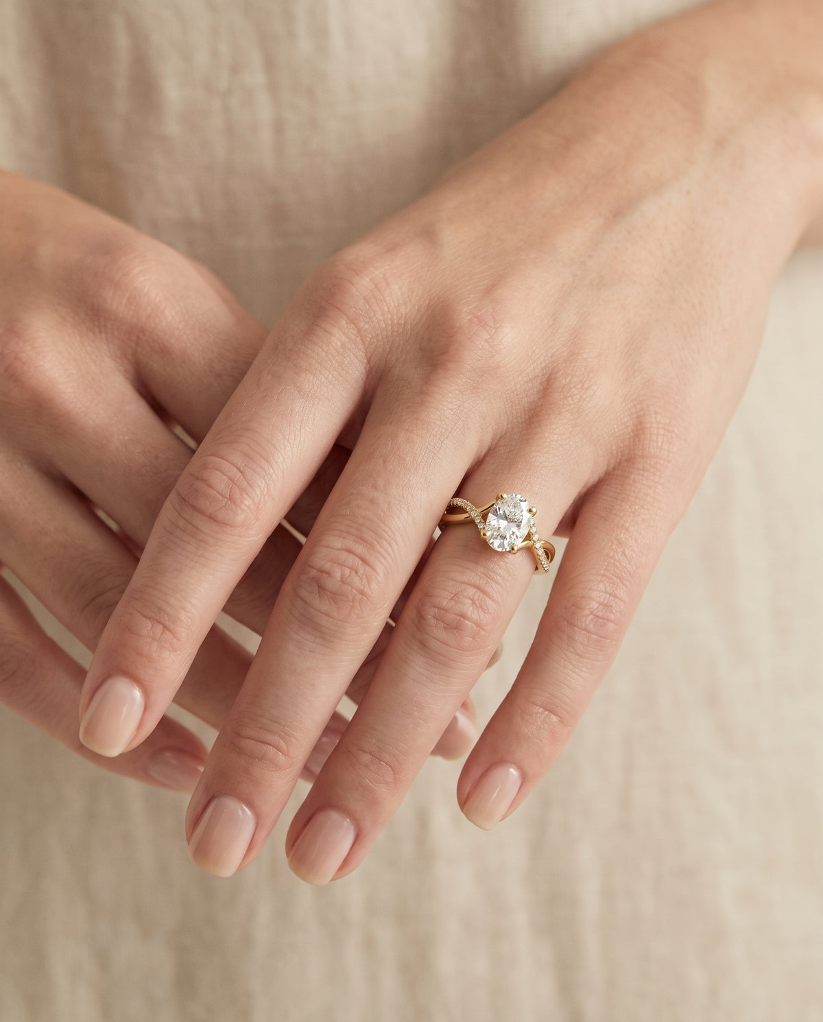 The Ottava Bypass Pavé Twist Oval Engagement Ring Setting in 18K Yellow Gold