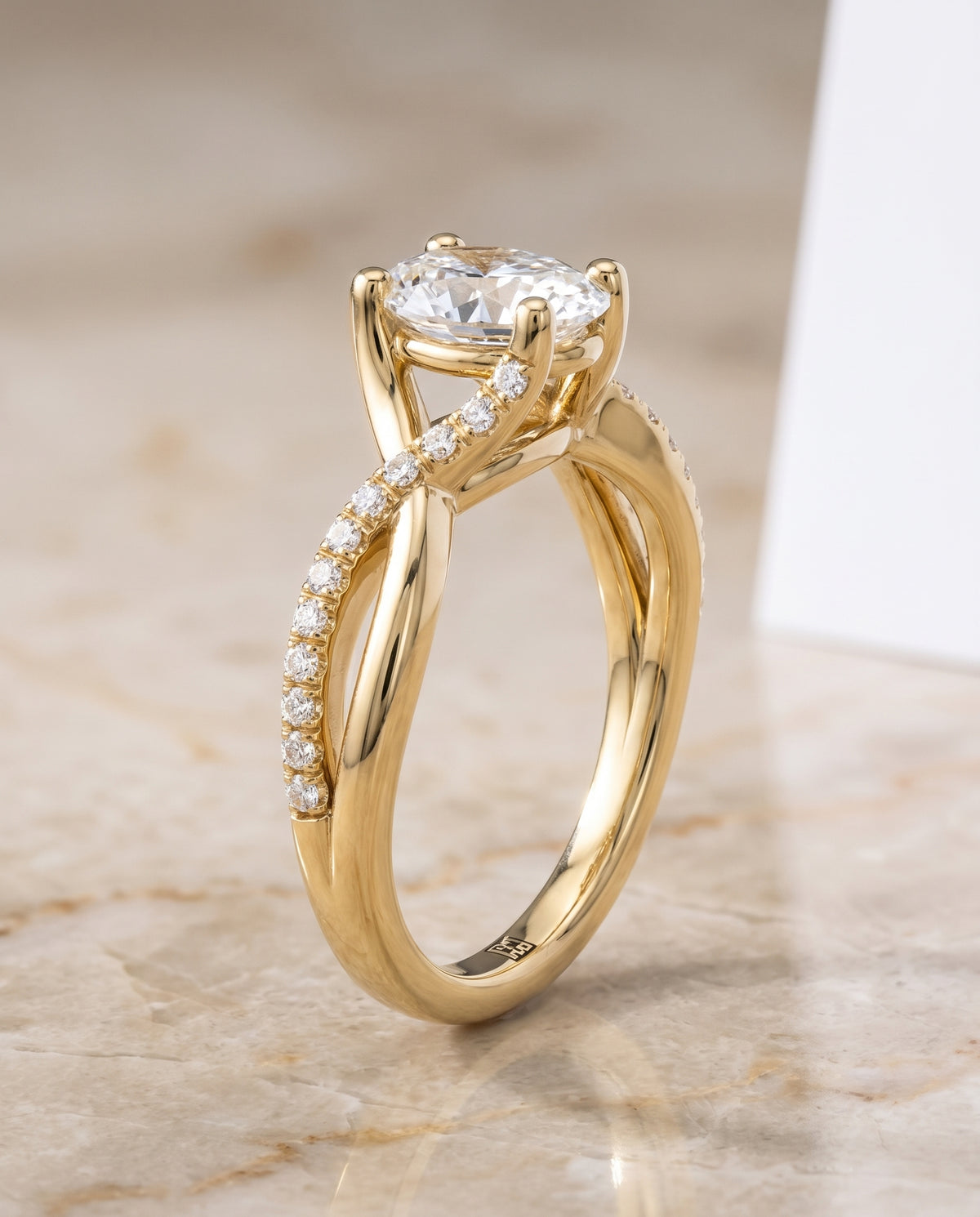 The Ottava Bypass Pavé Twist Oval Engagement Ring Setting in 18K Yellow Gold