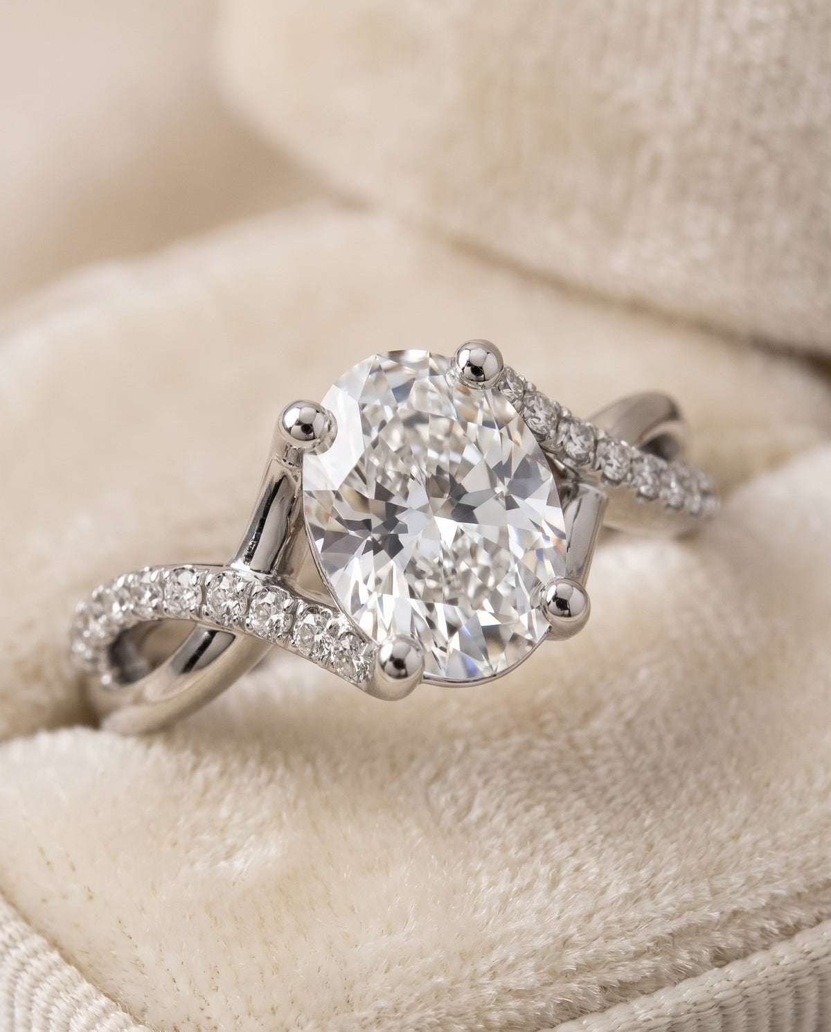 The Ottava Bypass Pavé Twist Oval Engagement Ring Setting in Platinum
