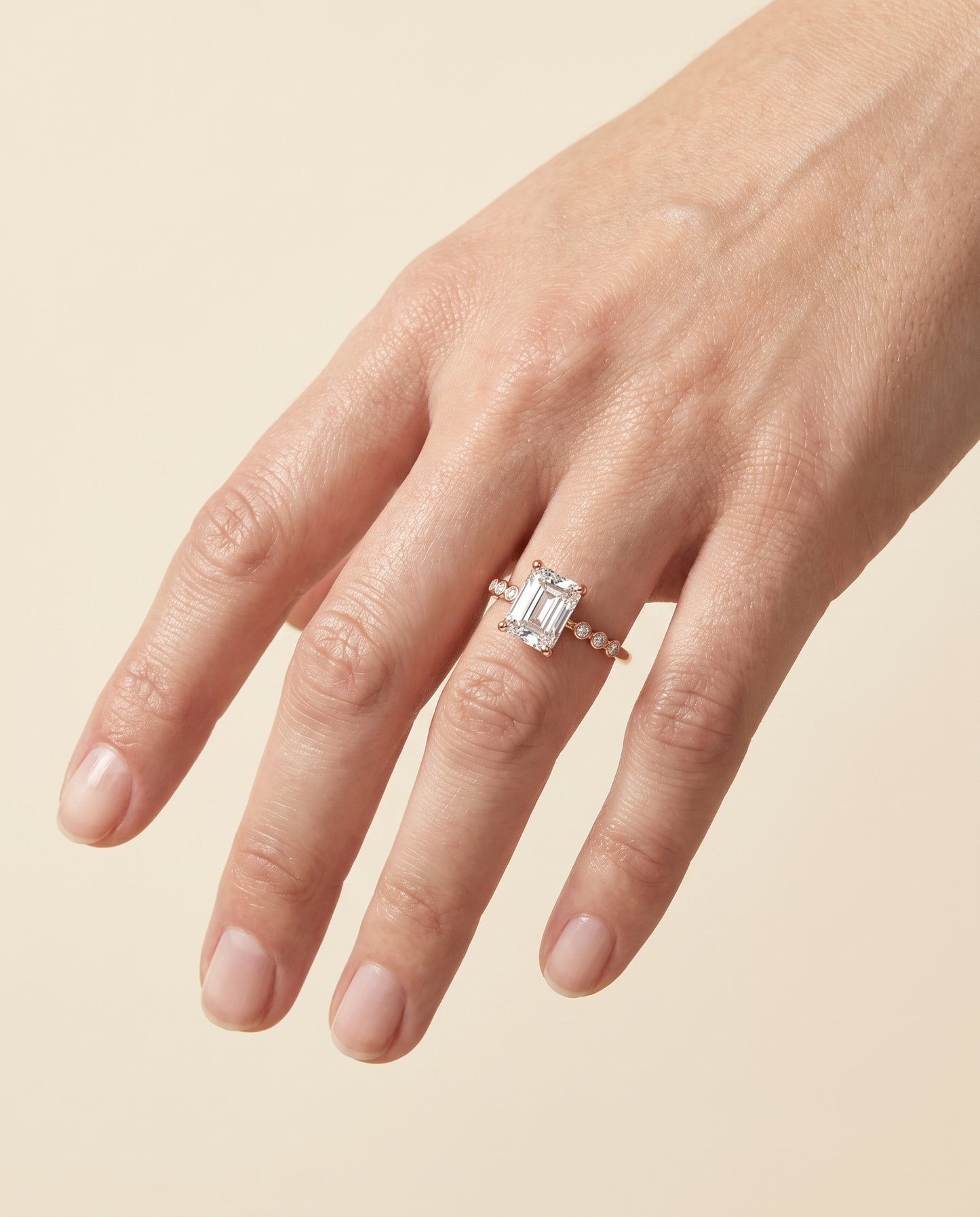 The Peggy Bezel Accent Solitaire Radiant Cut Engagement Ring Setting in 14K Rose Gold