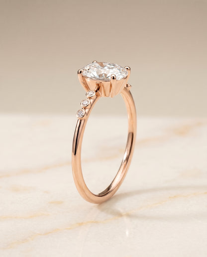The Peggy Bezel Accent Solitaire Oval Engagement Ring Setting in 14K Rose Gold