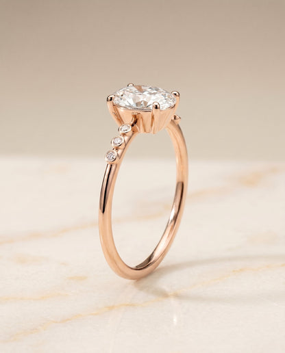 Peggy Select Bezel Accent Solitaire Oval Lab Diamond Engagement Ring in 14K Rose Gold, front view | RockHer